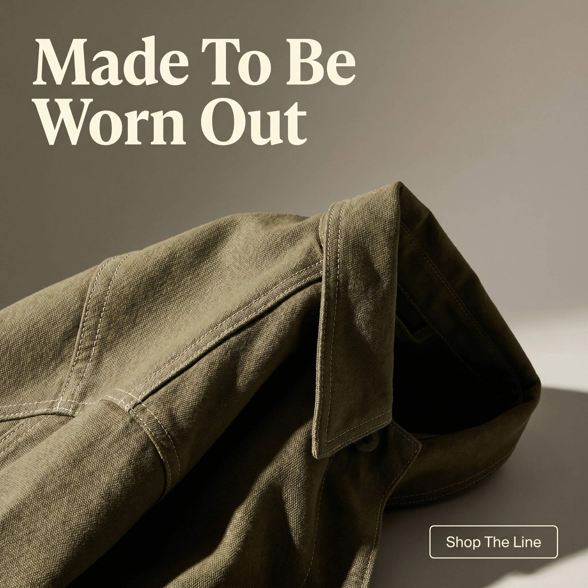 Fashion ecommerce hero ad example: close-up of a folded heavyweight jacket showing stitching with headline 'Made To Be Worn Out'