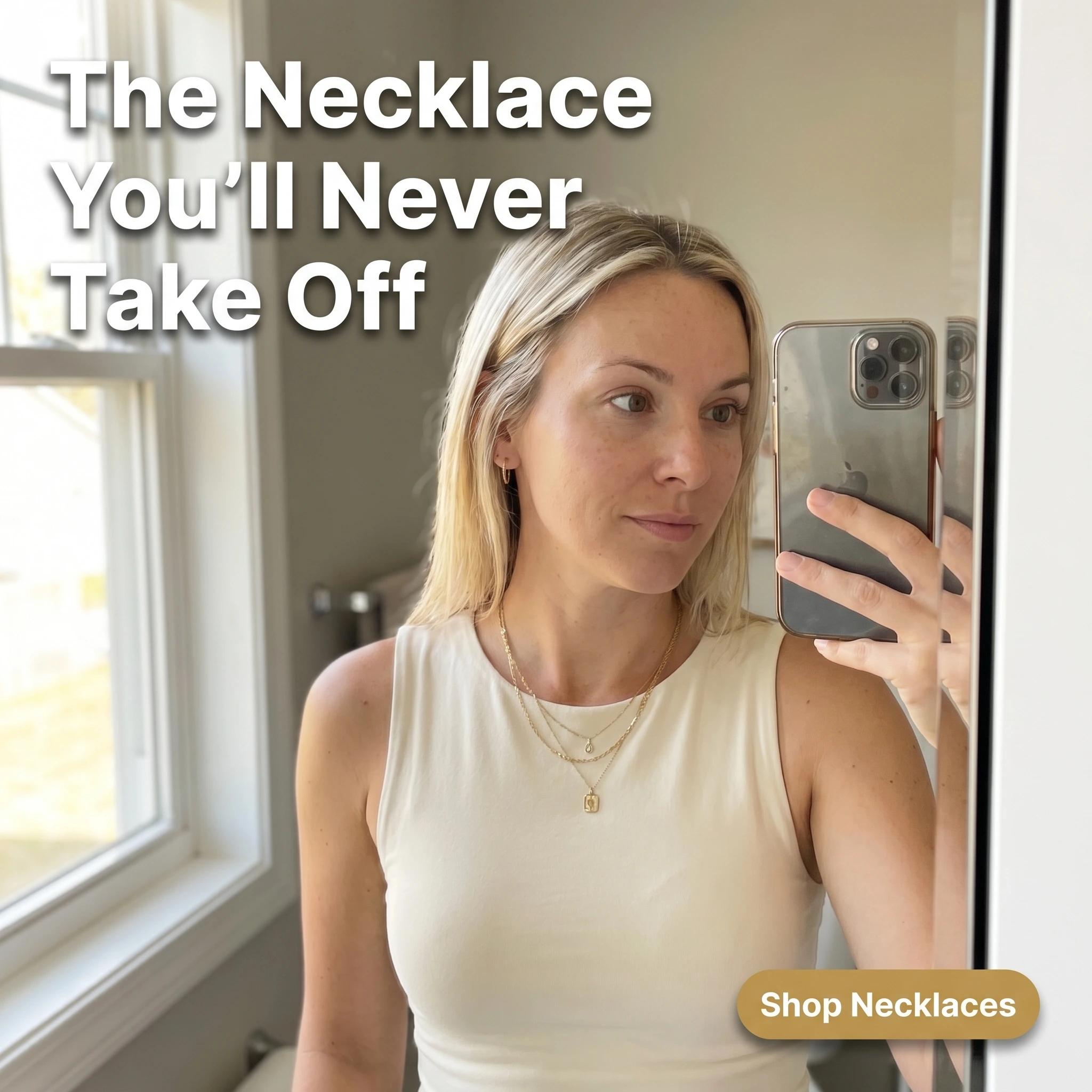 UGC-style jewelry ad example: woman in a mirror selfie wearing a layered gold necklace with headline 'The Necklace You'll Never Take Off'