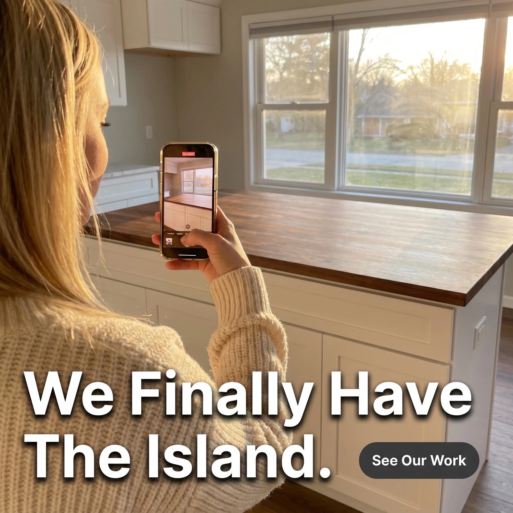 UGC-style kitchen remodeling ad example: woman filming her new kitchen island on her phone with headline 'We Finally Have The Island'